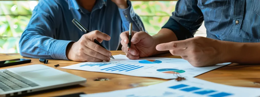 an seo professional and a client discussing website performance metrics and milestones over a transparent whiteboard.