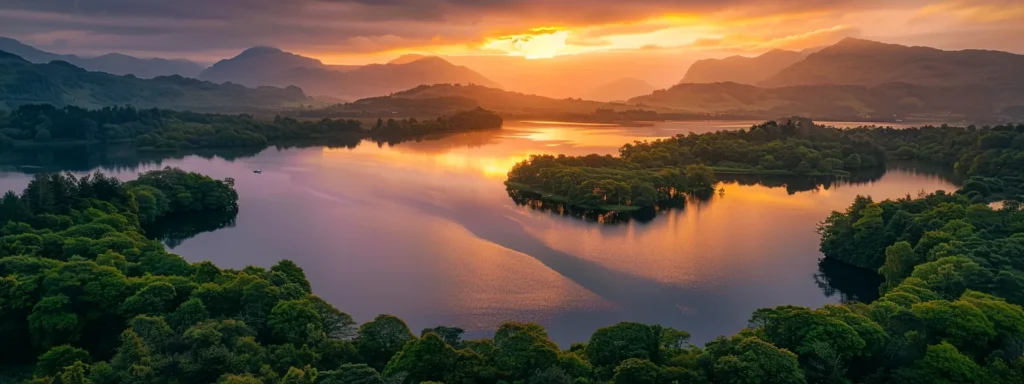 a breathtaking sunset casts vibrant hues of orange and pink across a tranquil lake, reflecting the surrounding lush forest and striking mountains in the shimmering water.