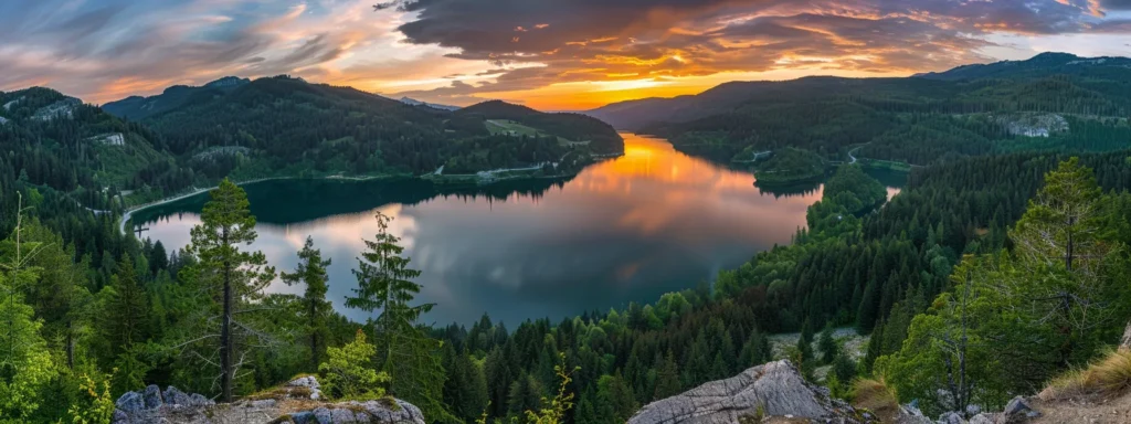 a vibrant sunset casts a golden glow over a tranquil lake, reflecting the fiery sky and surrounded by lush green forests, creating a serene and picturesque landscape.